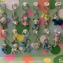 Porte-clés divers "paillettes" lot de 12 pièces